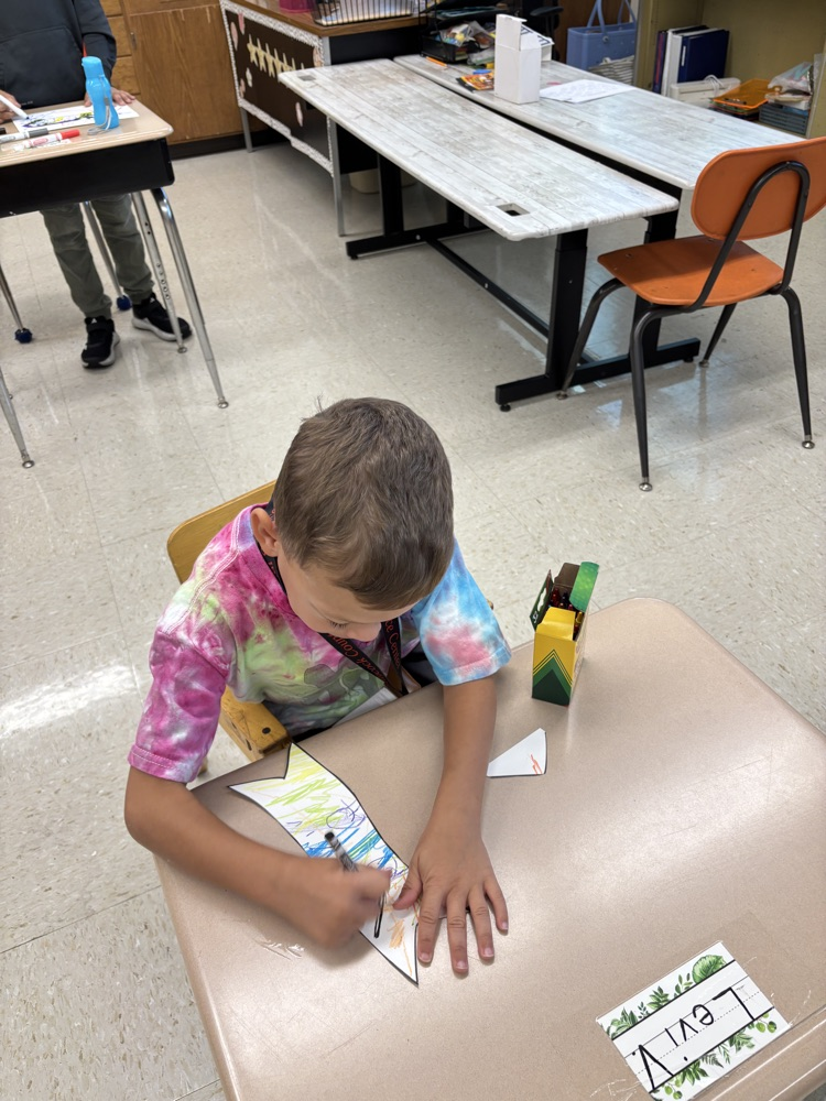 student working on banner