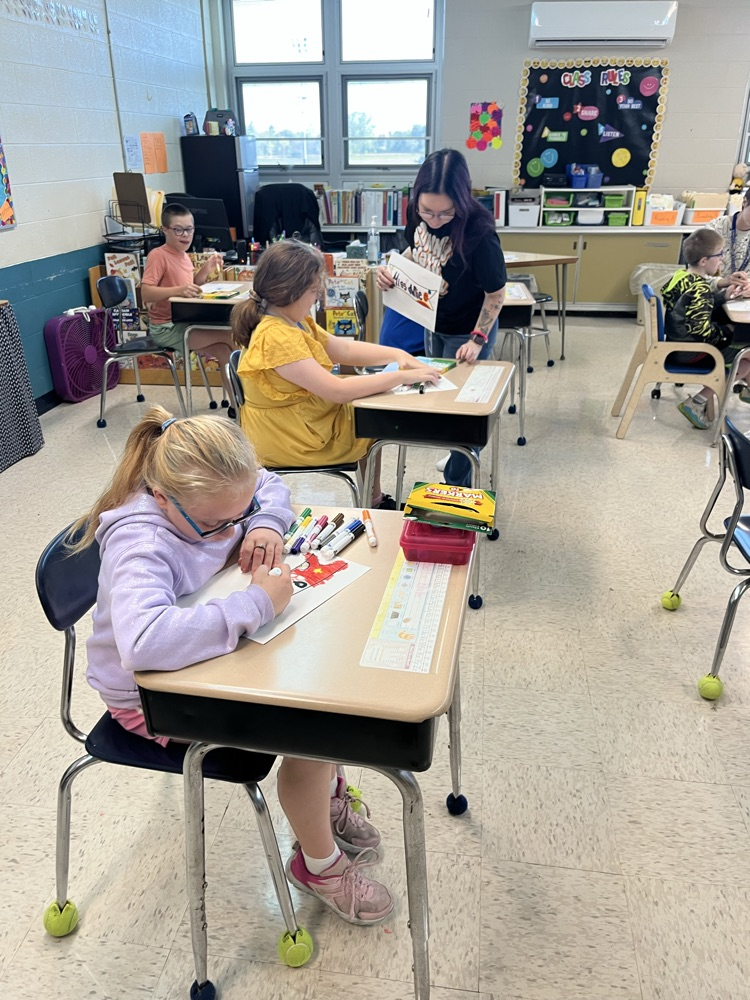 students working on banner