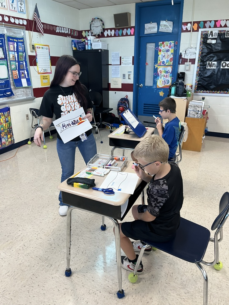 students working on banner