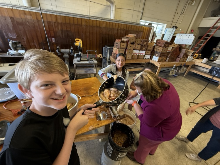 students making apple butter