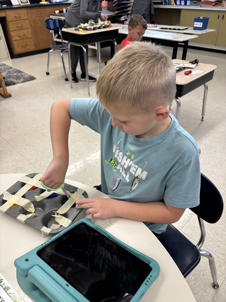 students practicing cutting