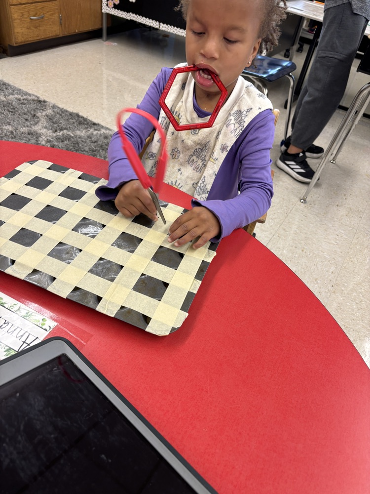 students practicing cutting