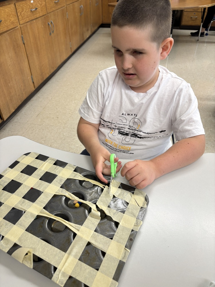 students practicing cutting