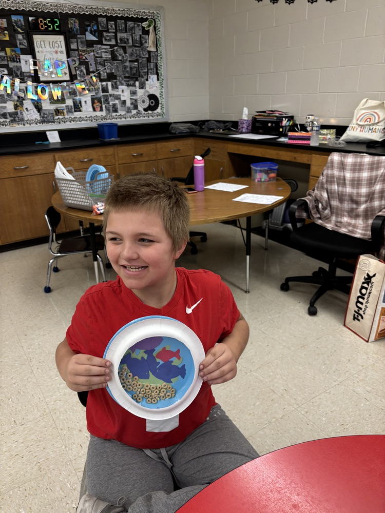 student with their aquarium