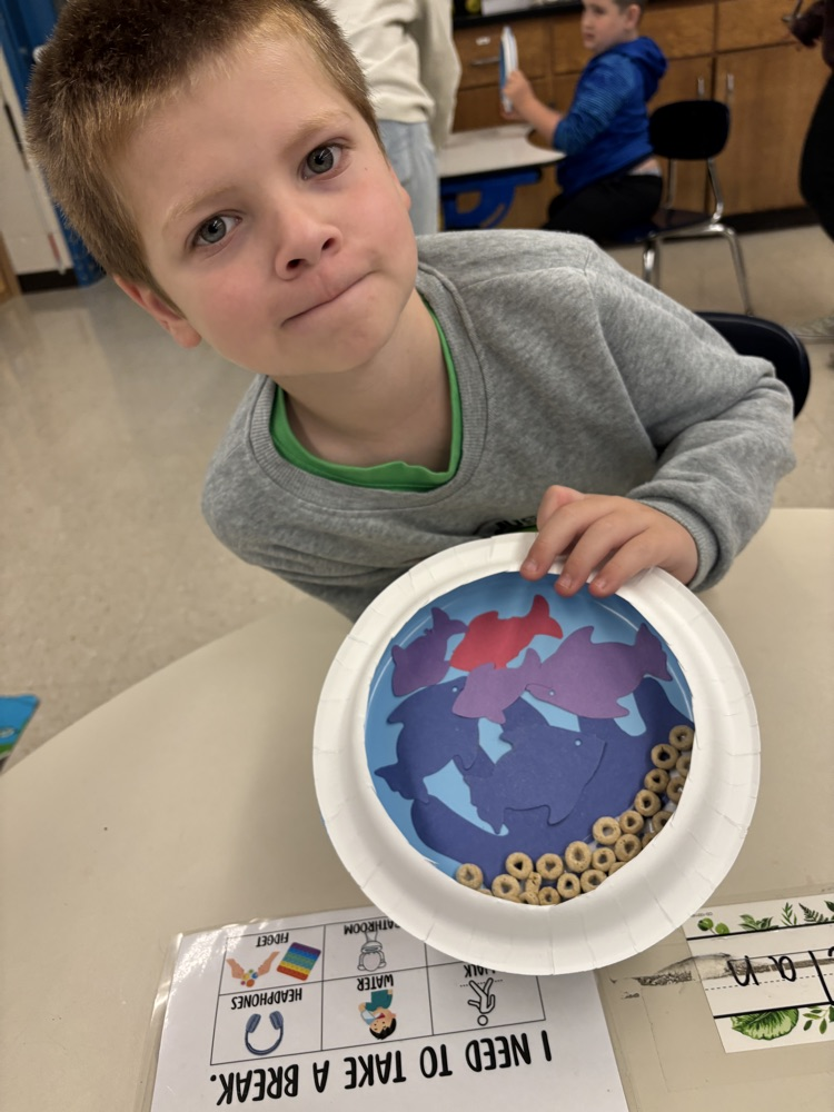 student with their aquarium