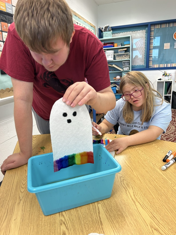 students dunking ghosts
