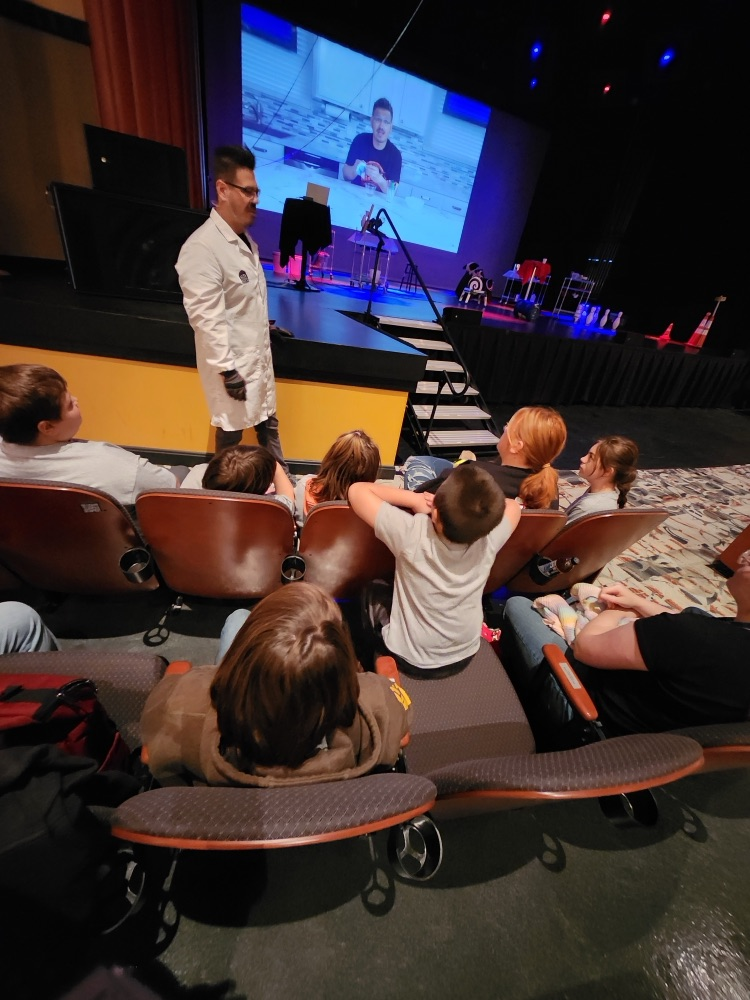 students watching performance