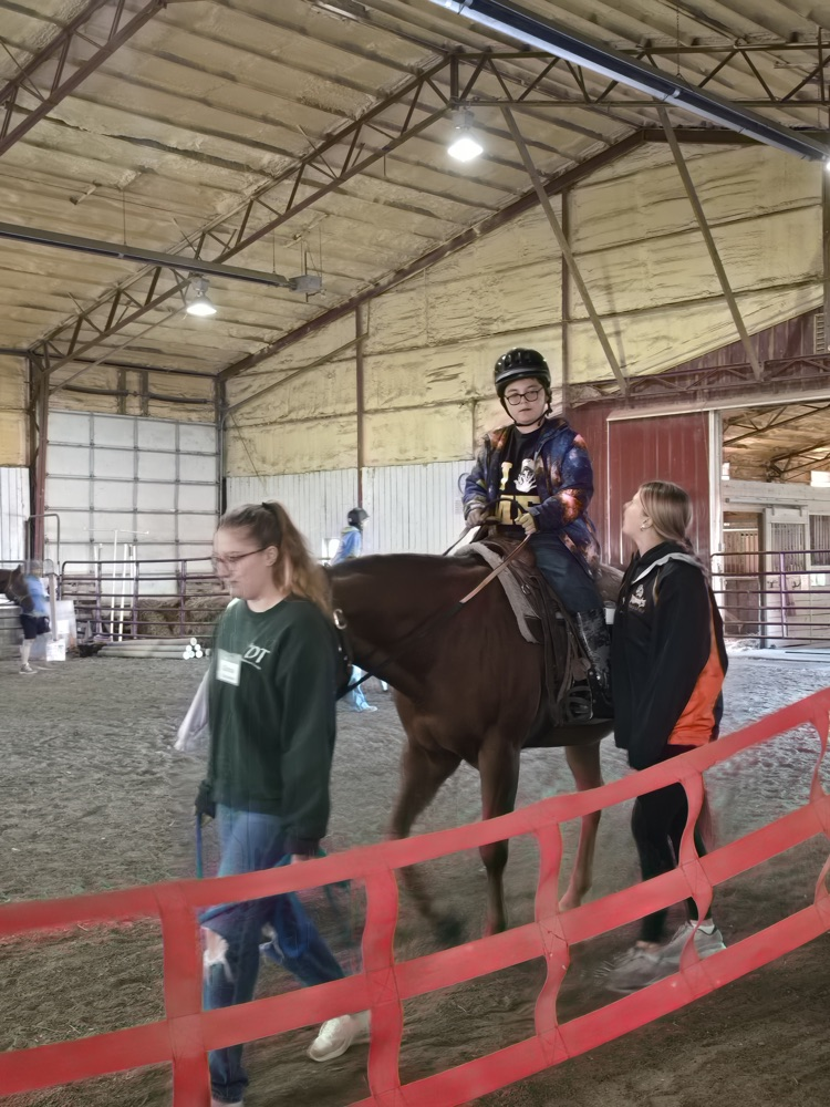 student on horse