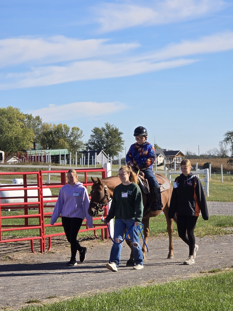 student on horse