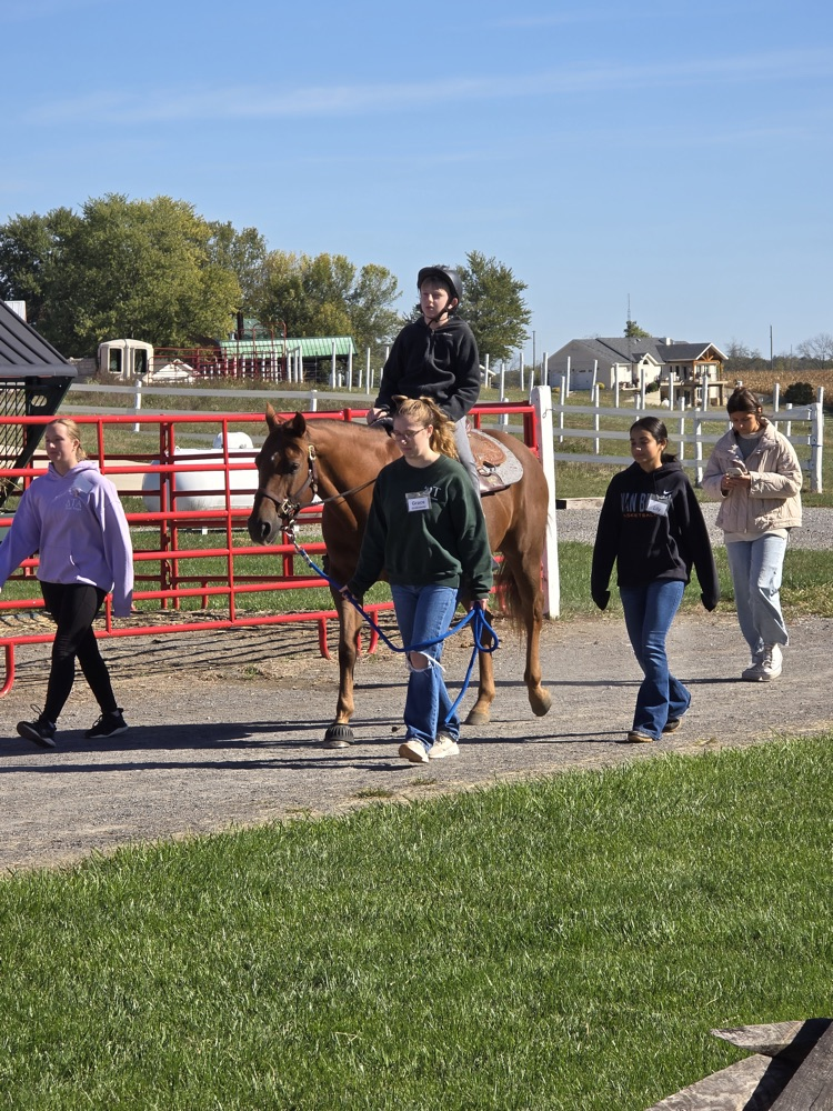 student on horse
