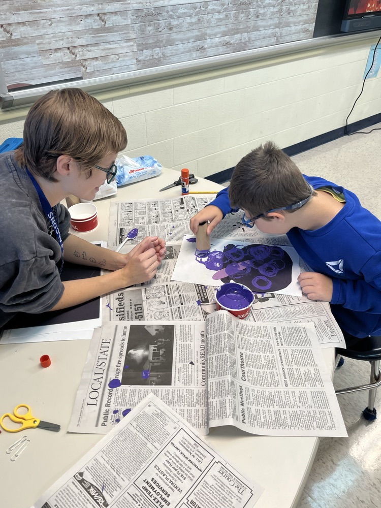 student making bubble art