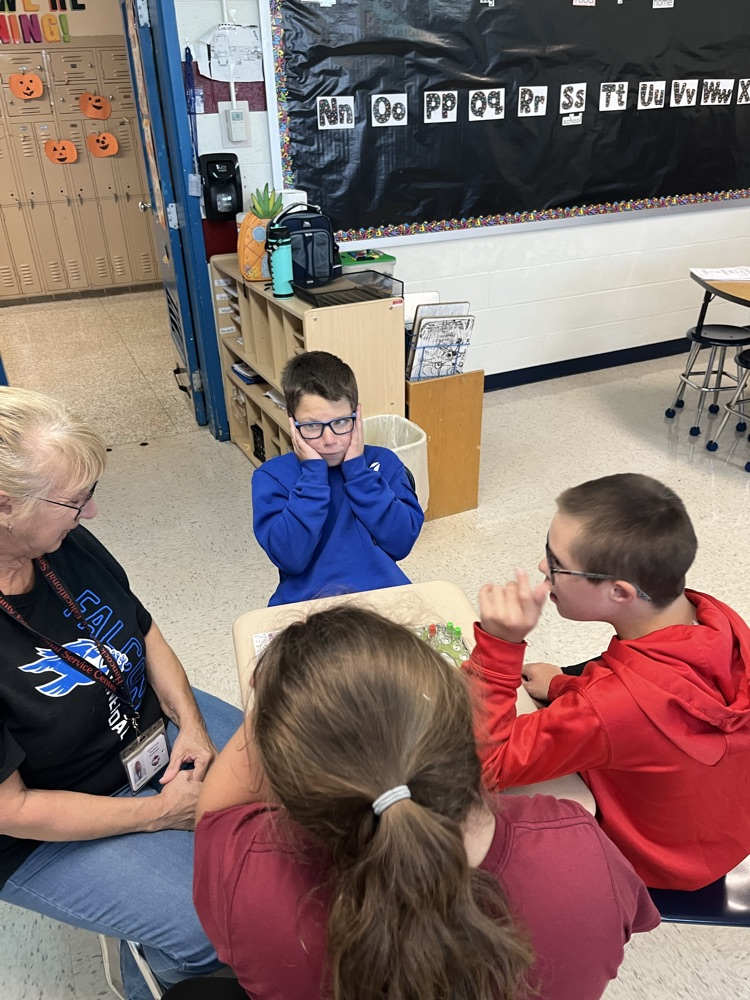 students playing games and taking turns