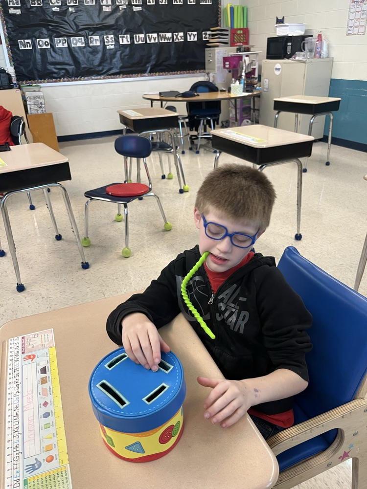 student playing games and taking turns