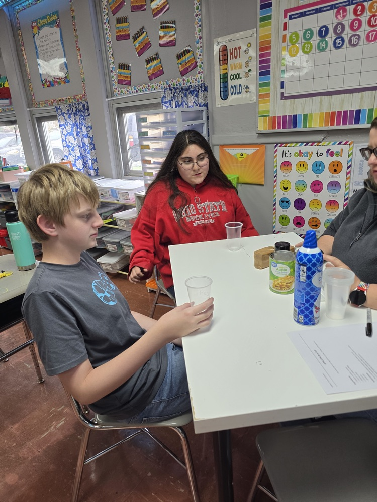 students making and eating apple pie