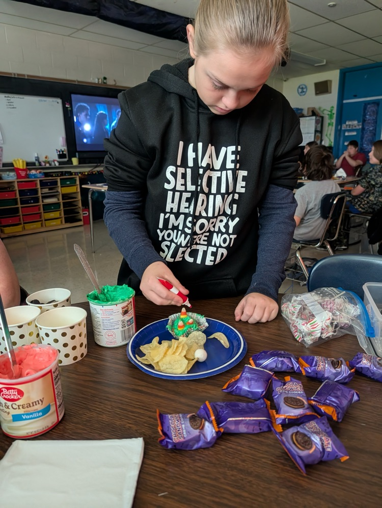 students making Halloween treats 
