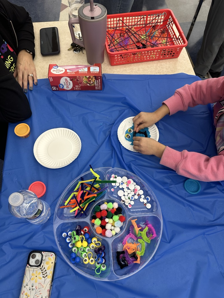 students crafting monsters with playdoh