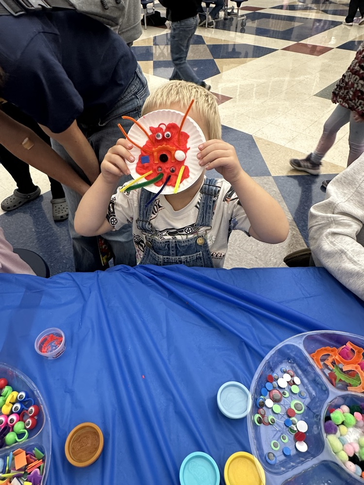 students crafting monsters with playdoh