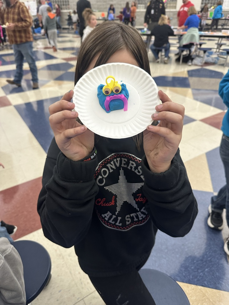 students crafting monsters with playdoh
