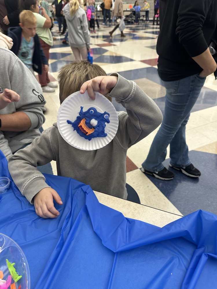 students crafting monsters with playdoh
