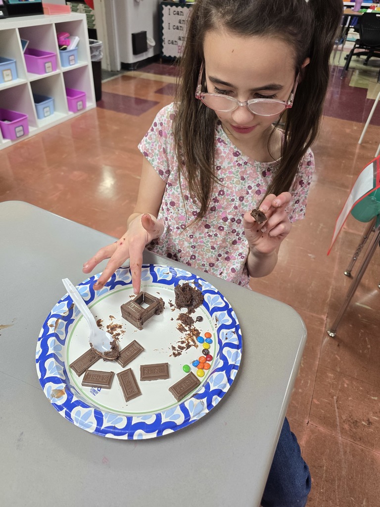 student making a house made of chocolate
