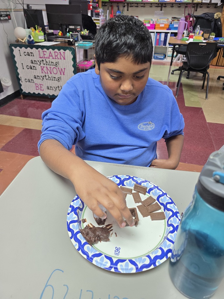 student making a house made of chocolate
