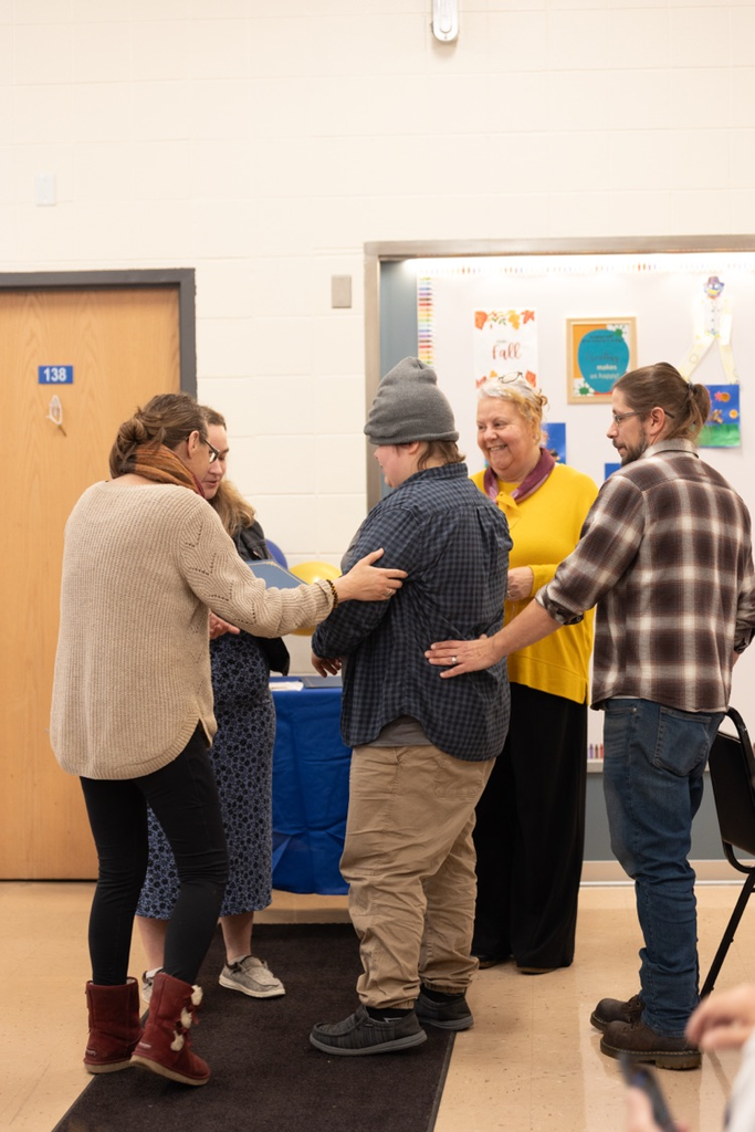 student, teachers and family 