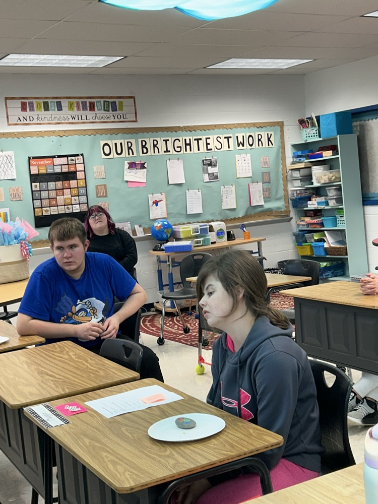 students listening to a speaker