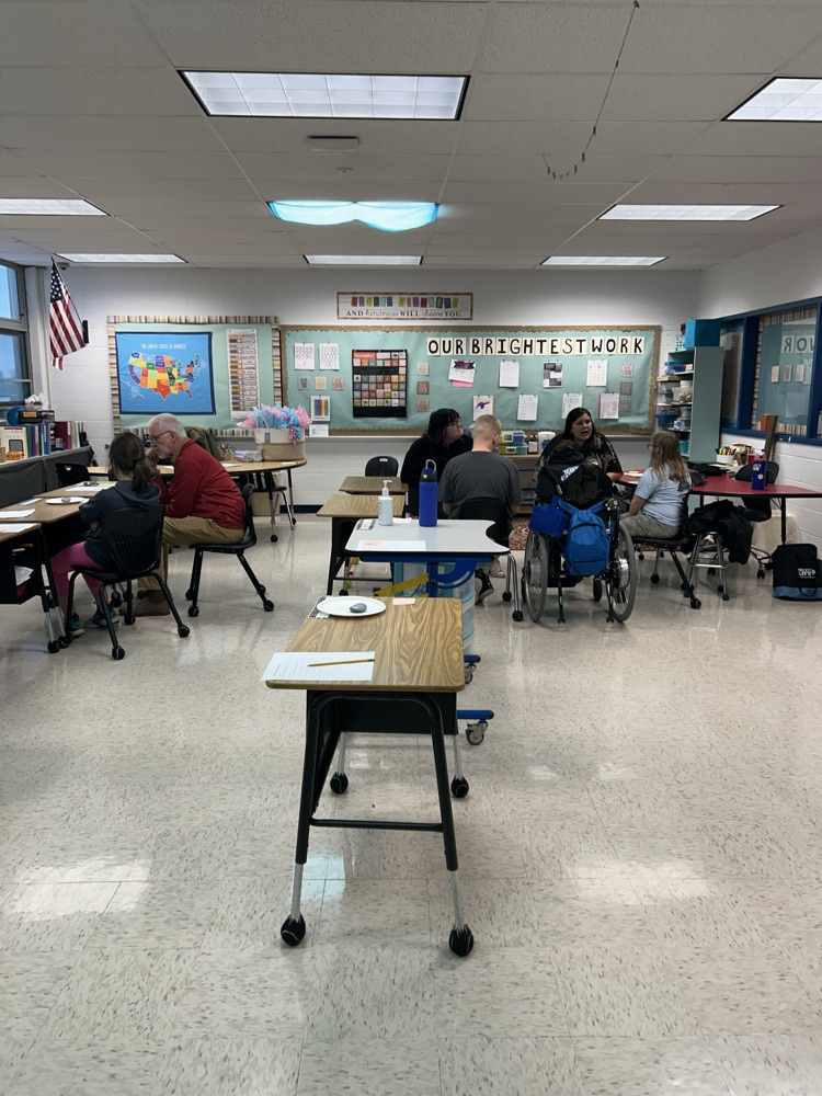 students listening to a speaker