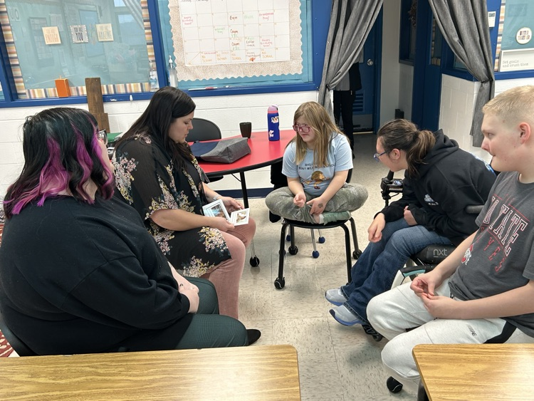 students listening to a speaker