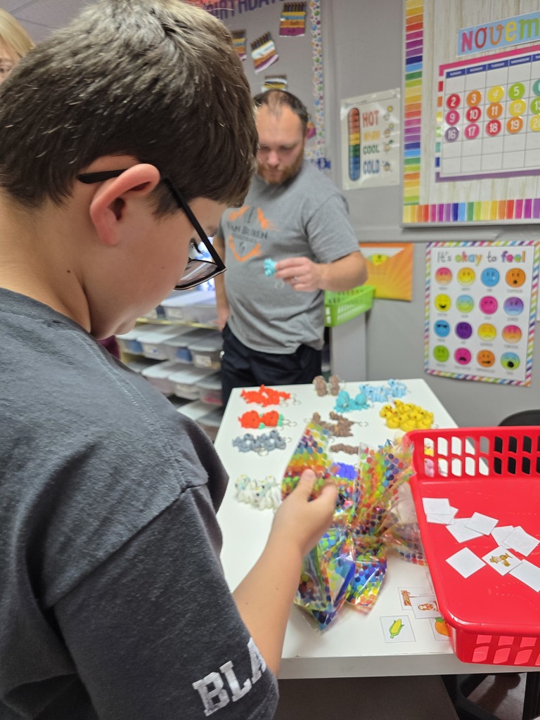 student choosing bingo prize