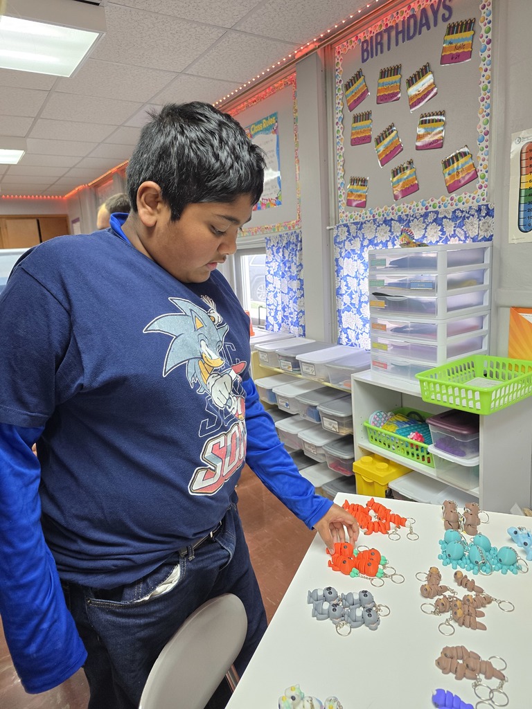 student choosing bingo prize