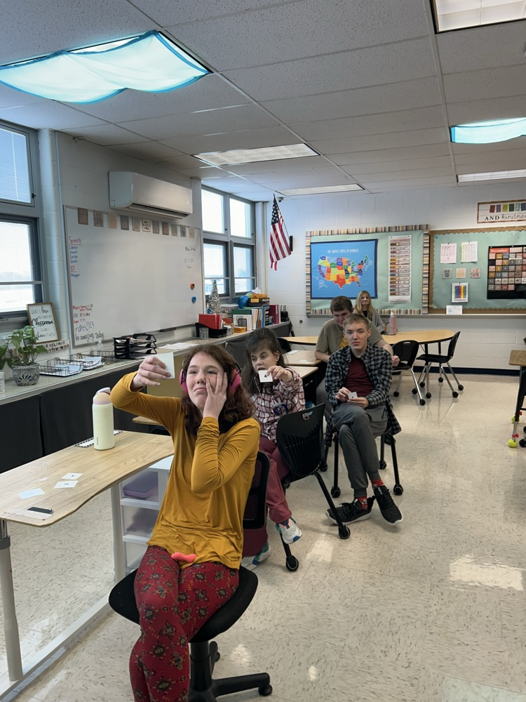 students listening to speaker 