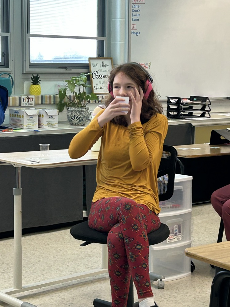 students listening to speaker 