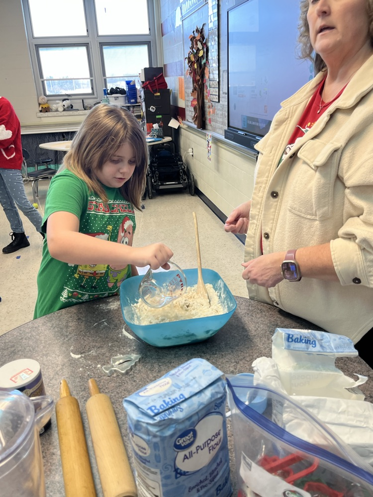 student pouring water