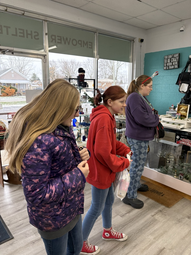 students in thrift store