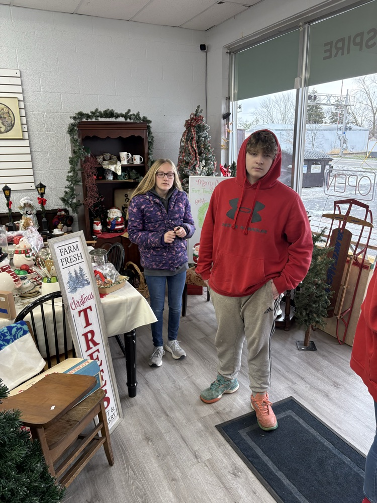 students in thrift store