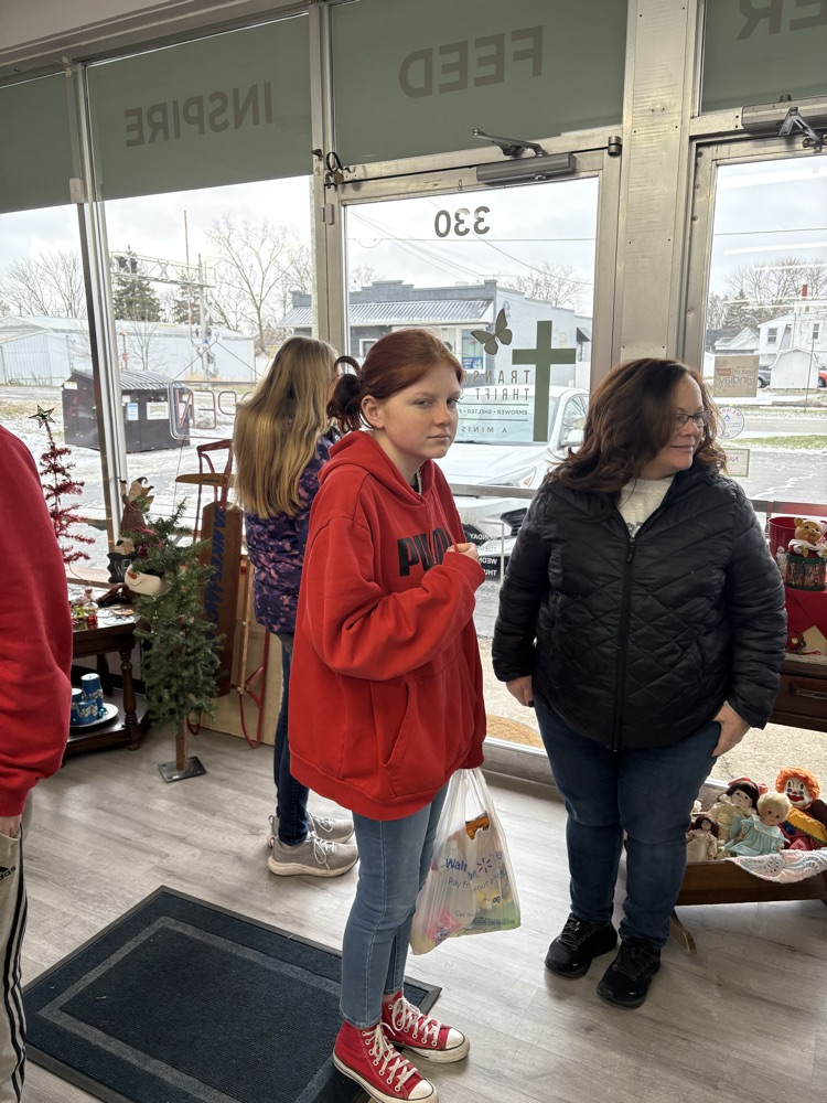 students in thrift store