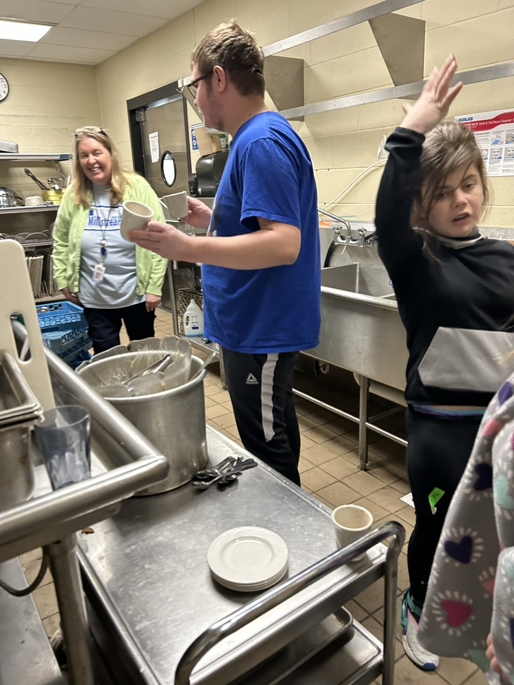 student at dishwasher 