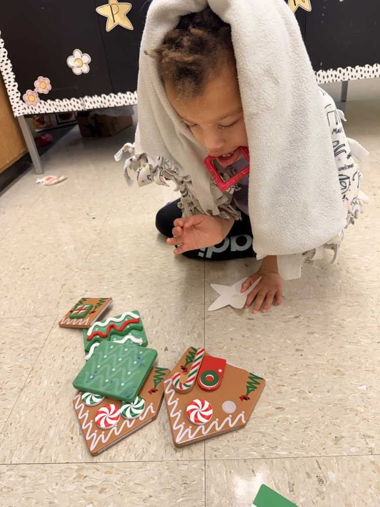 student with gingerbread magnetites