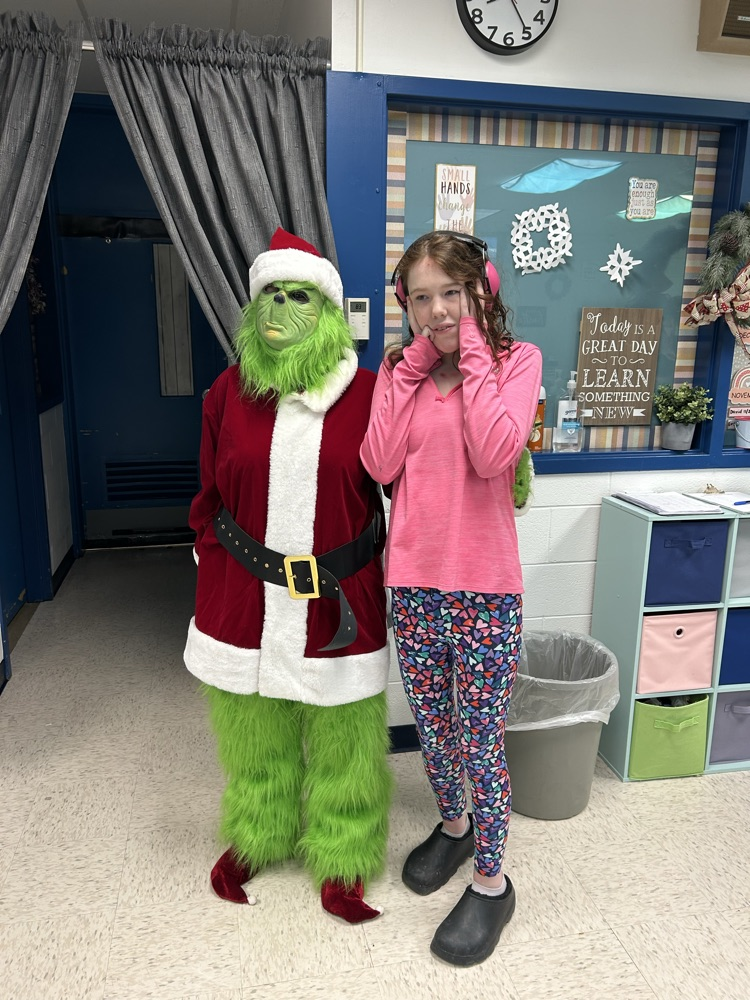 student with the grinch