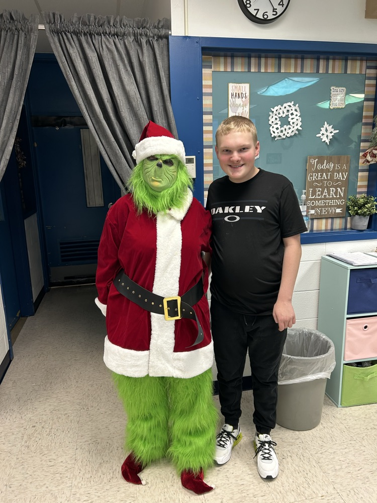 student with the grinch