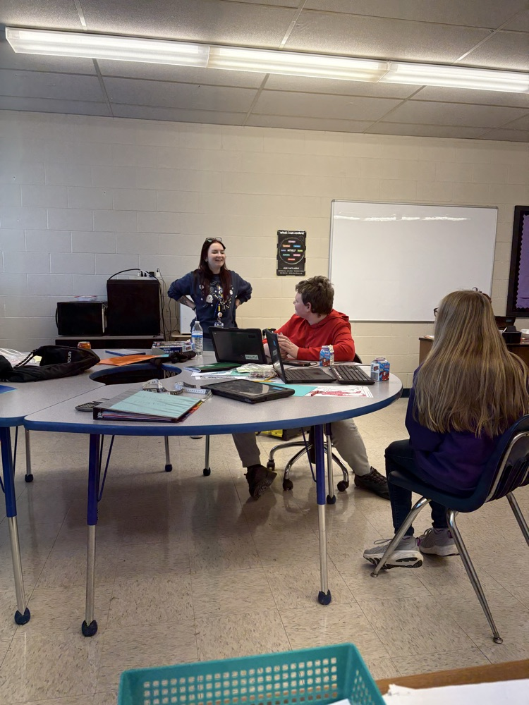 student painting ornament