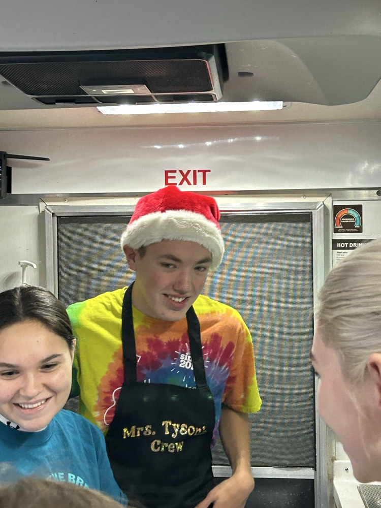 students working on coffee truck