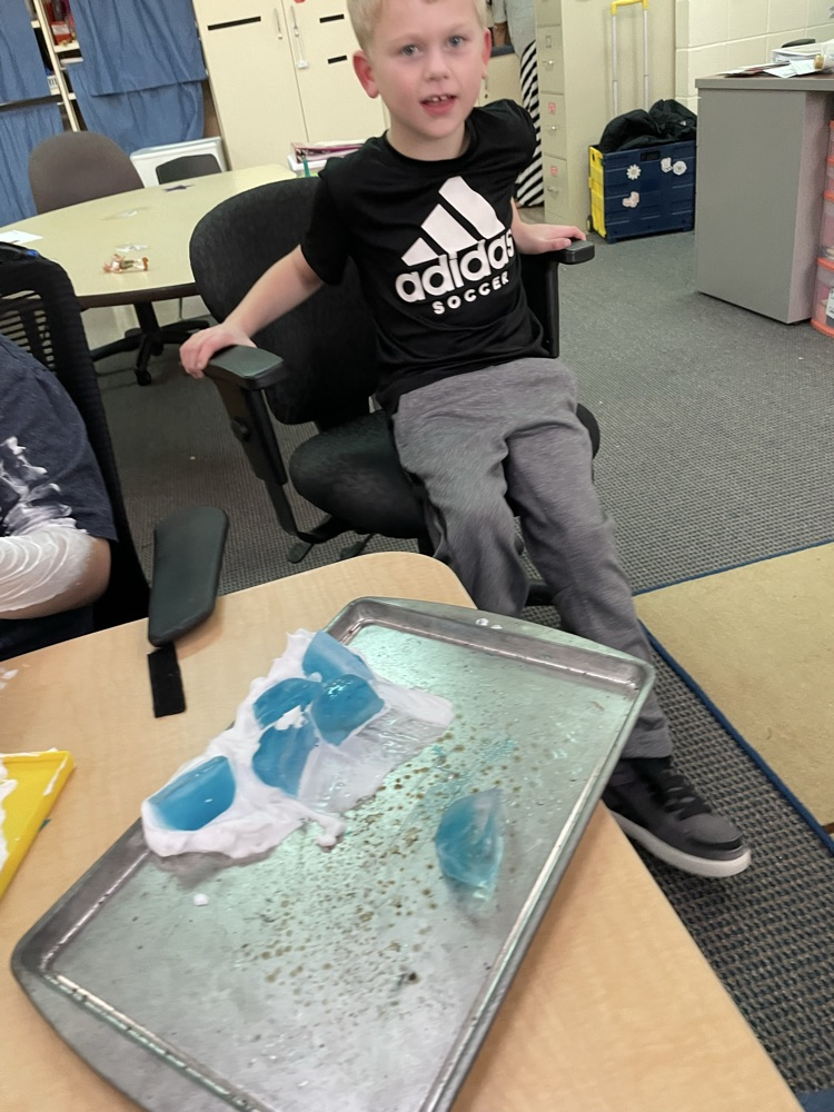 student playing in snow cream