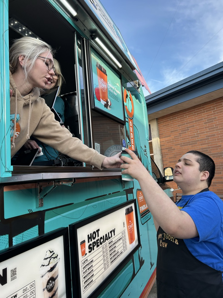 student taking drink