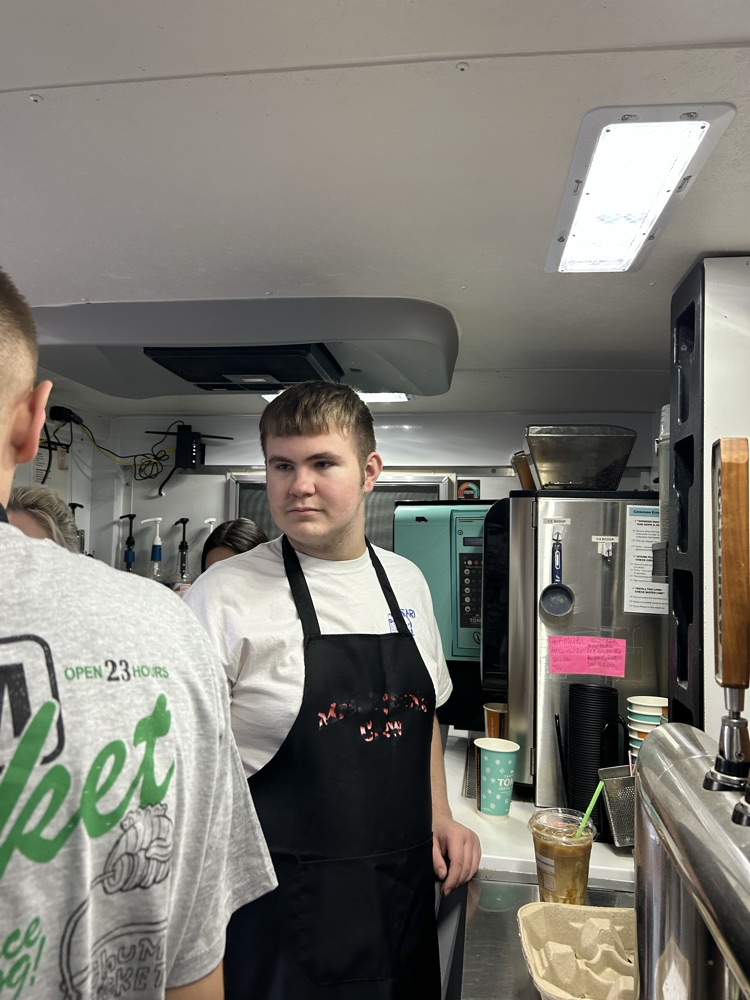 student taking orders 