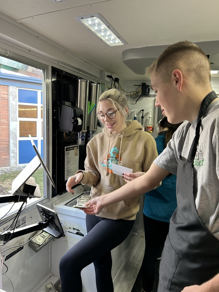 student taking order