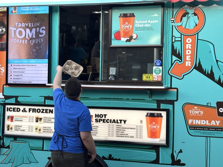 student returning drink carrier