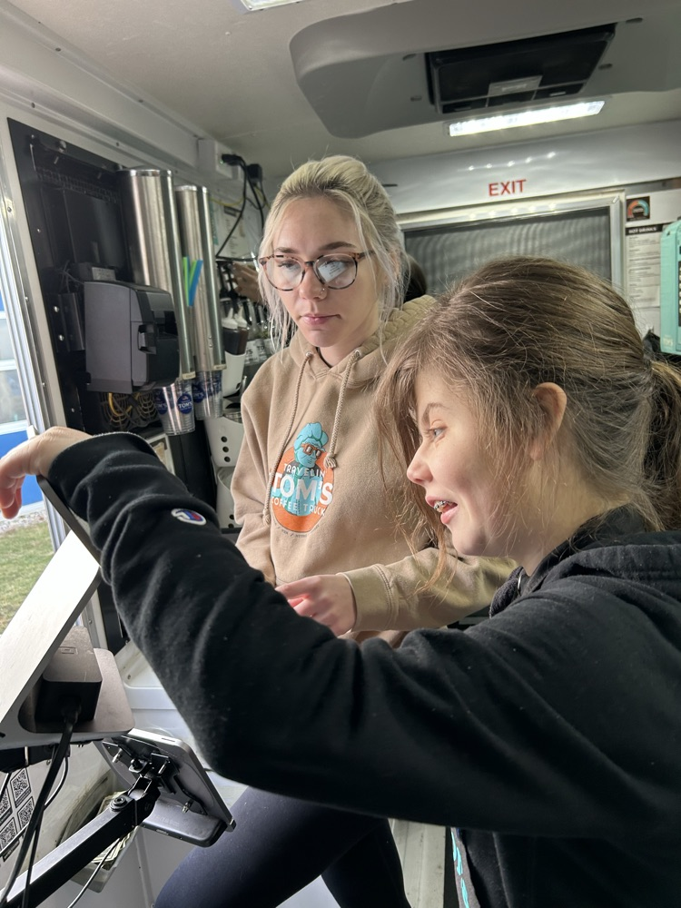 student taking order