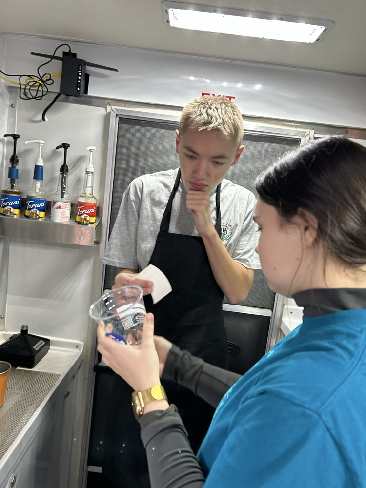 student taking order